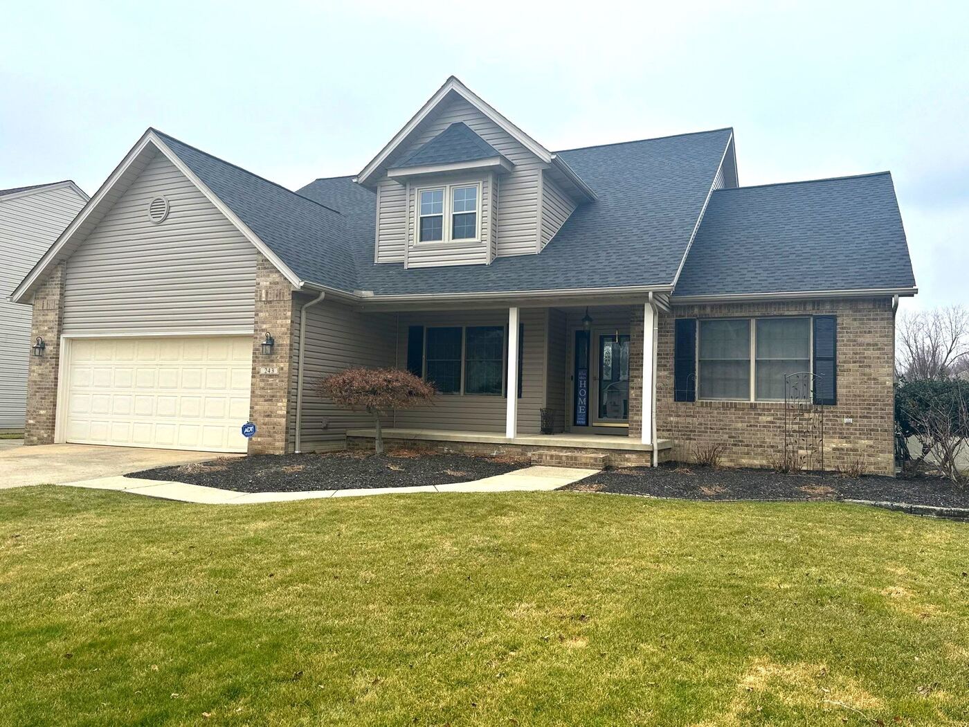 Beautiful home exterior with new roof